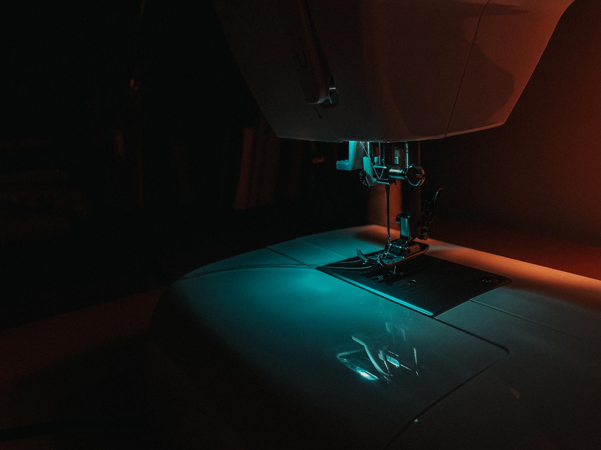 workstation with embroidery machine and sample